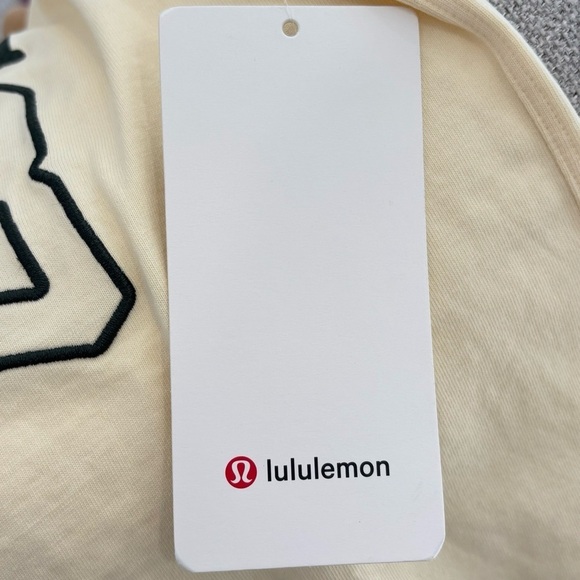 NWT Lululemon Relaxed Fit Cotton Graphic Jersey Tee Size 2 In Butter Cream - Picture 5 of 6